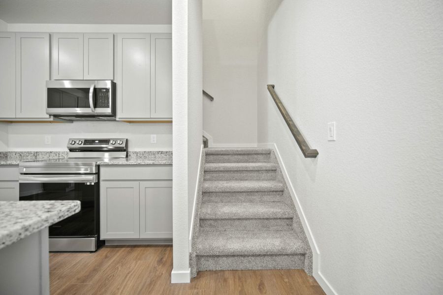Representative furnished interior of a home built from the Manitou by View Homes in Aspen Meadows – Townhomes, Colorado Springs (Image 10). Representative furnished interior of a home built from the Manitou by View Homes in Aspen Meadows – Townhomes, Colorado Springs (Image 10).