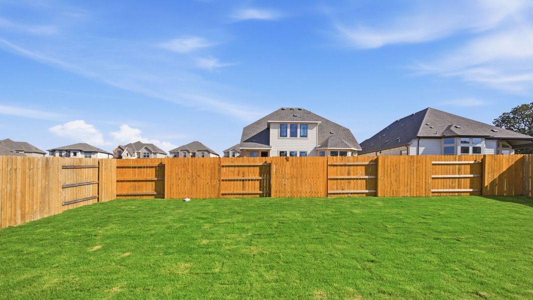 Exterior details and patio area of a home in Oaks at San Gabriel, Georgetown (Image 22).