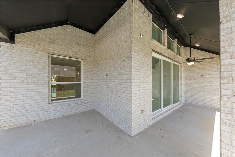 Front exterior of a new home in Valencia on The Lake, Little Elm, TX, highlighting curb appeal (Image 20).