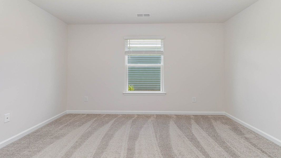 Representative unfurnished interior of a home built from the CALI by D.R. Horton in Heritage Crossing, Conway (Image 22).