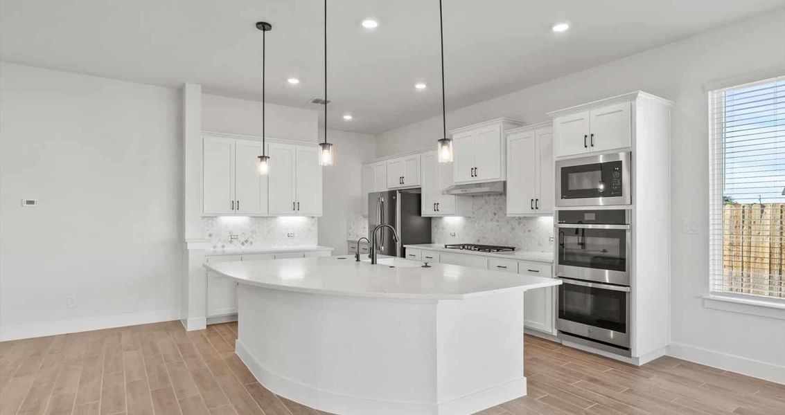 Furnished interior view inside a new home in Village at Three Oaks, Seguin (Image 5). Furnished interior view inside a new home in Village at Three Oaks, Seguin (Image 5).