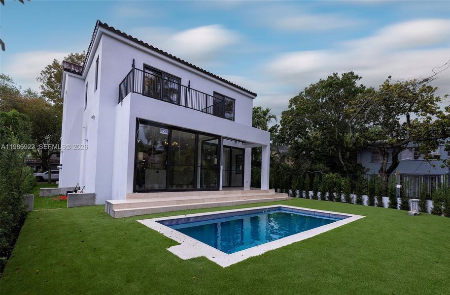Exterior details and patio area of a home in , Coral Gables (Image 3).