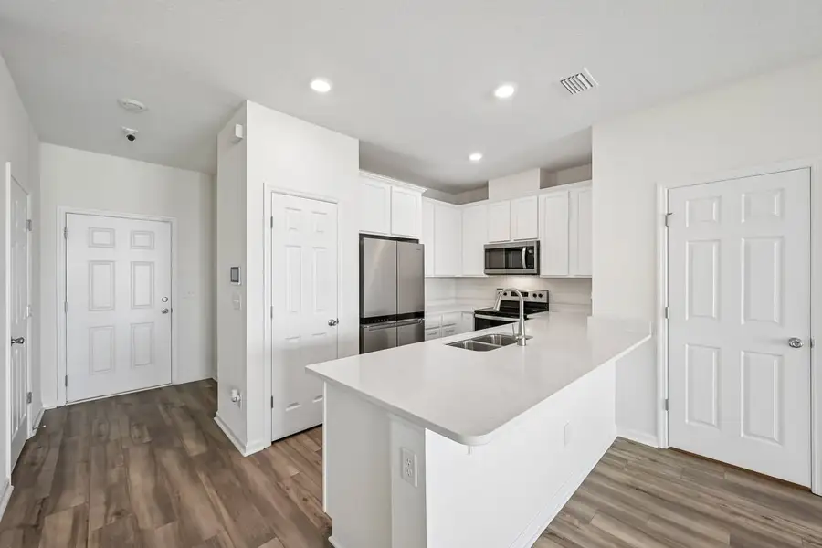 Furnished interior view inside a new home in Orchard Park Townhomes, St. Augustine (Image 7).