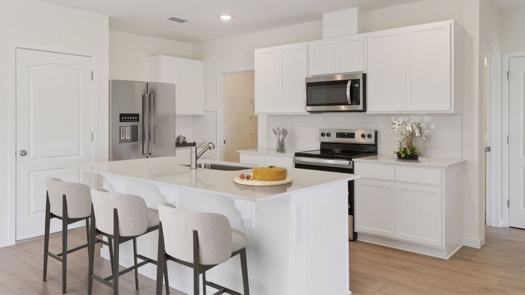 Representative furnished interior of a home built from the Robie by D.R. Horton in Kindred, Kissimmee (Image 3).