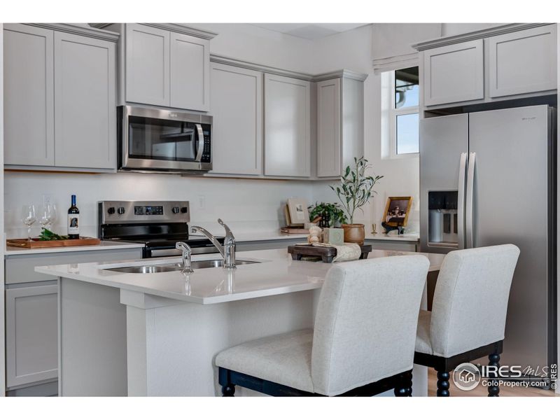 Furnished interior view inside a new home in Vista Meadows, Fort Lupton (Image 36).