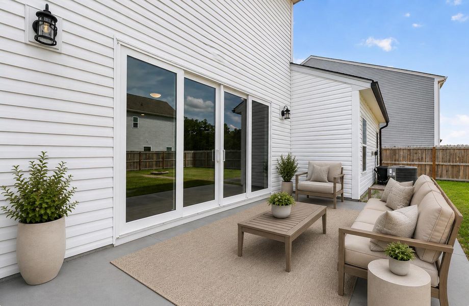Exterior details and patio area of a home in North Creek at Nexton, Summerville (Image 4). Exterior details and patio area of a home in North Creek at Nexton, Summerville (Image 4).