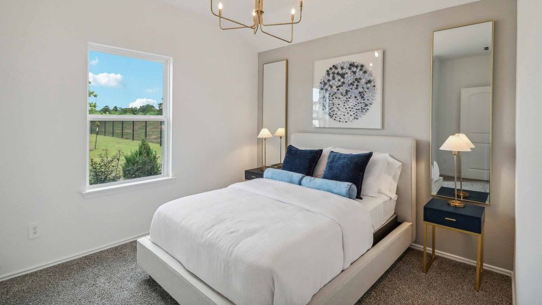 Furnished interior view inside a new home in Sunterra, Katy (Image 19).