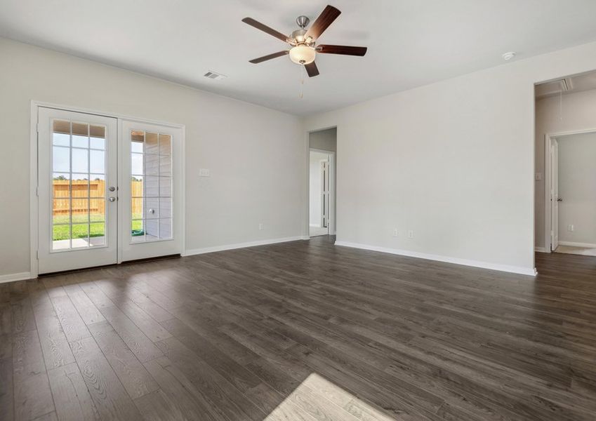 Spacious family room with vinyl flooring