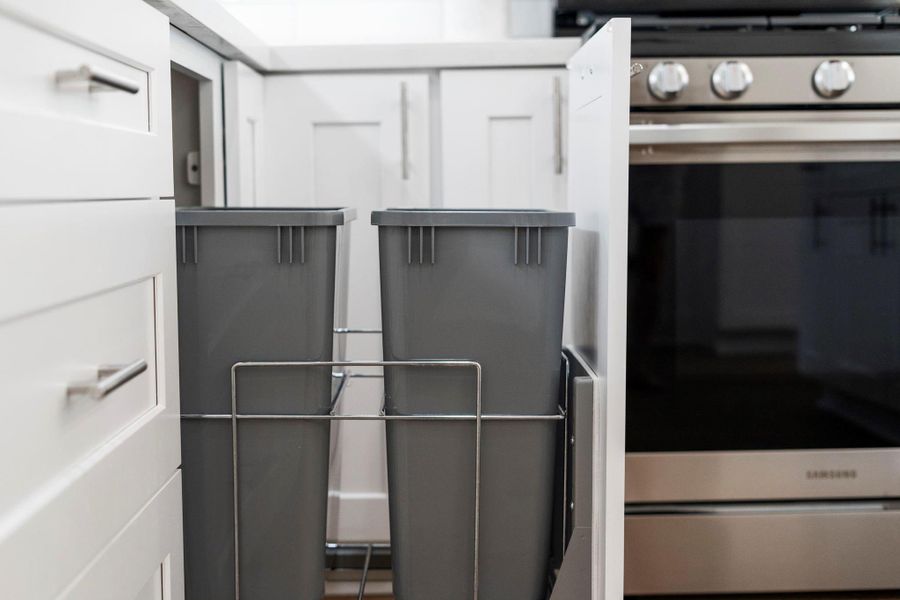 Convenient pull-out trash and recycling cabinet