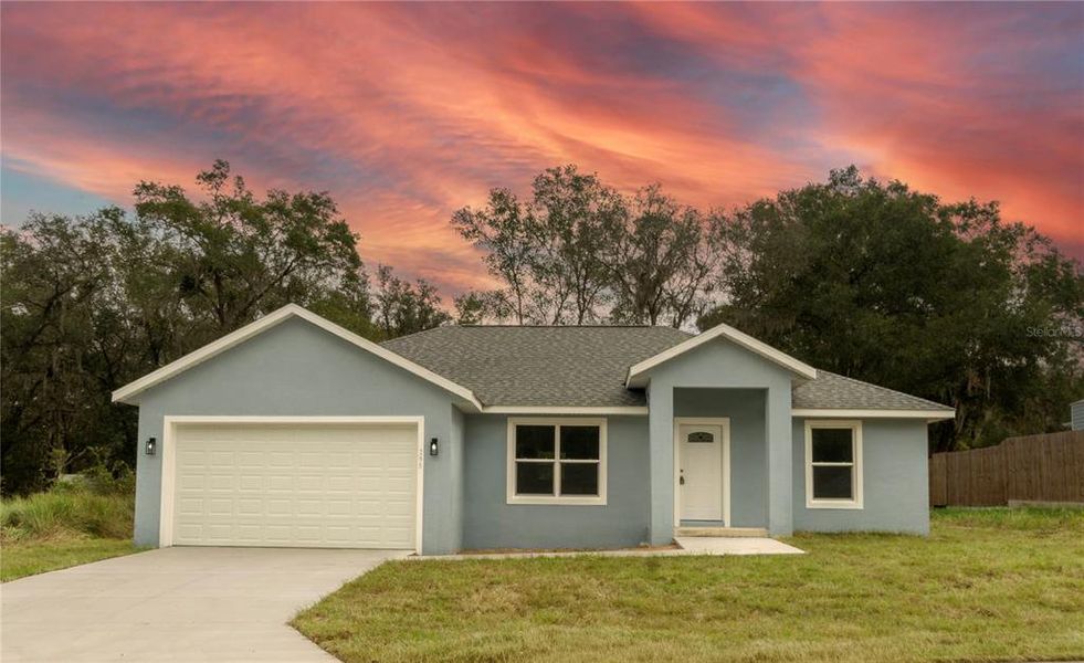 Front exterior of a new home in , Ocala, FL, highlighting curb appeal (Image 1). Front exterior of a new home in , Ocala, FL, highlighting curb appeal (Image 1).