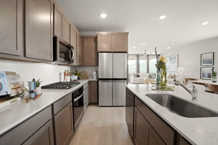 Kitchen in the Willow home plan by Trophy Signature Homes – REPRESENTATIVE PHOTO