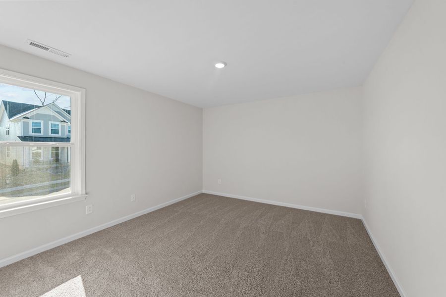 Spacious, unfurnished interior of a new home in Neill's Pointe, Angier (Image 32).