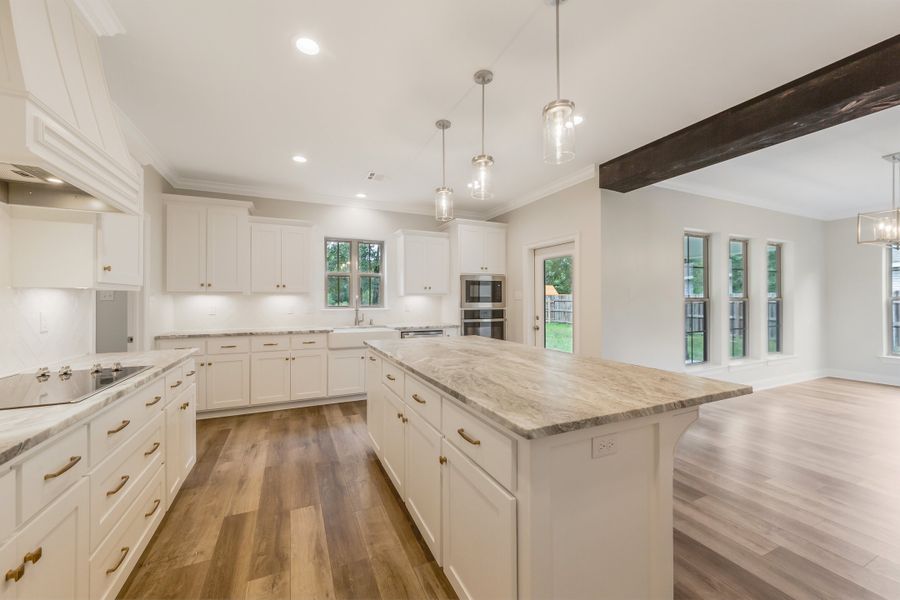 Representative furnished interior of a home built from the The Evangeline by Manuel Builders in Chapel Bend, Montgomery (Image 7). Representative furnished interior of a home built from the The Evangeline by Manuel Builders in Chapel Bend, Montgomery (Image 7).