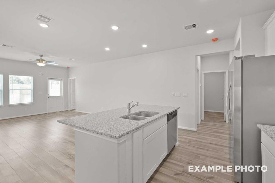 Furnished interior view inside a new home in Spring Branch Crossing, Conroe (Image 4).