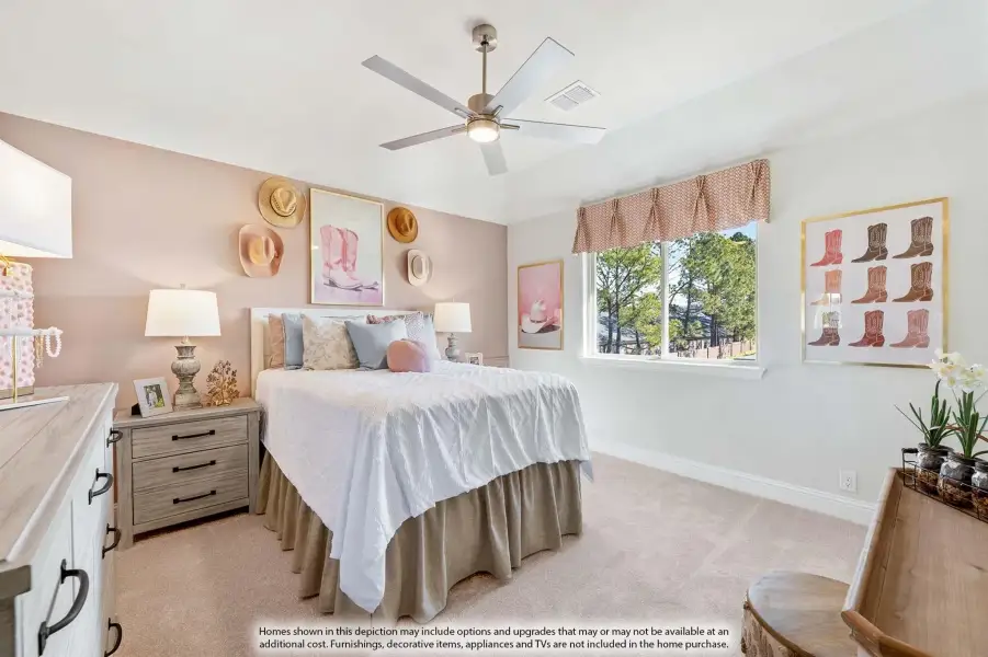 Bedroom with pink walls, ceiling fan, queen bed, and western-themed wall art