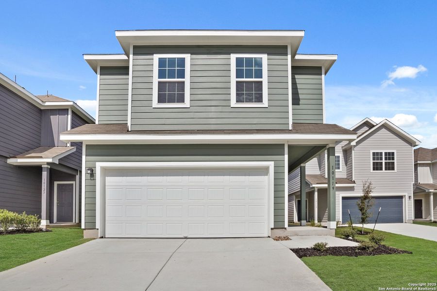 Front exterior of a new home in Melissa Ranch, San Antonio, TX, highlighting curb appeal (Image 2). Front exterior of a new home in Melissa Ranch, San Antonio, TX, highlighting curb appeal (Image 2).