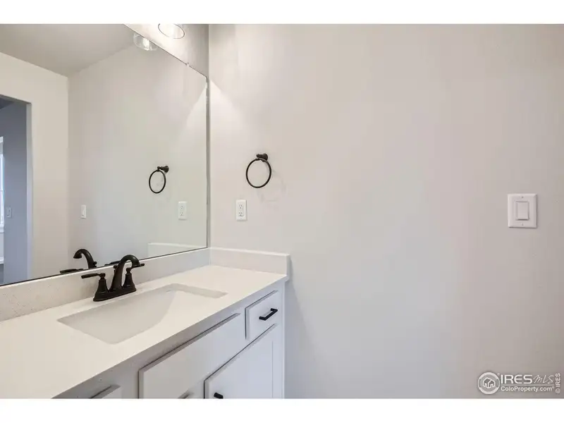 Furnished interior view inside a new home in RainDance, Windsor (Image 10).