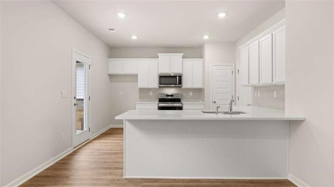 Furnished interior view inside a new home in WillowBrook, Winder (Image 7).