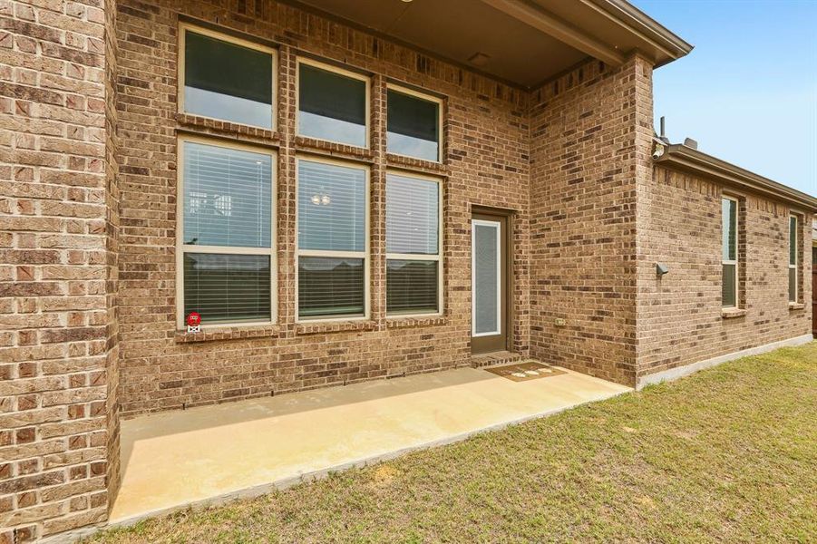 Exterior details and patio area of a home in Silverado, Aubrey (Image 28).
