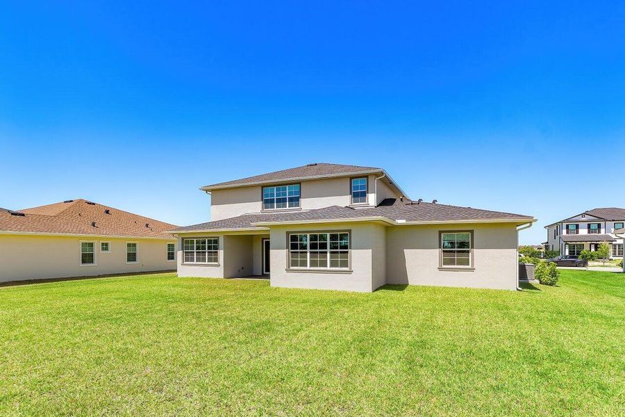 Front exterior of a new home in , Loxahatchee, FL, highlighting curb appeal (Image 28).