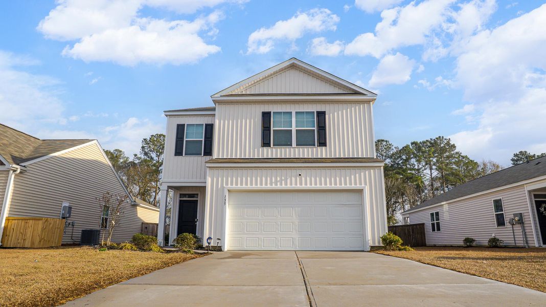 Front exterior of a new home in , Summerville, SC, highlighting curb appeal (Image 18).