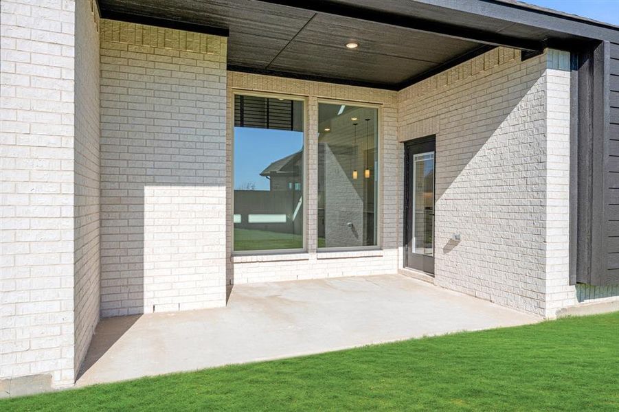 Exterior details and patio area of a home in Willow Wood Classic 60, McKinney (Image 22).