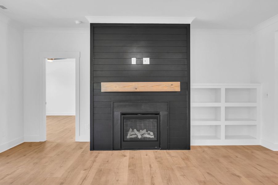 Representative furnished interior of a home built from the The Bradley by RobuckHomes in Windwater, Hampstead (Image 15).