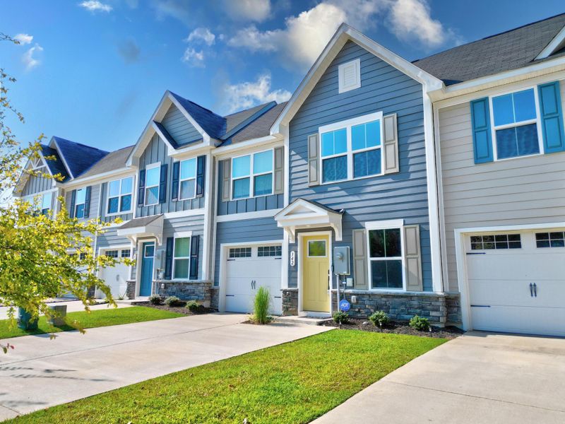 Front exterior of a new home in , Santee, SC, highlighting curb appeal (Image 21).