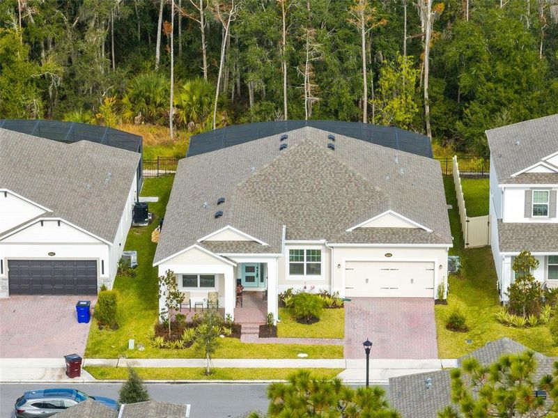 Front exterior of a new home in Eden at Crossprairie, St. Cloud, FL, highlighting curb appeal (Image 22).