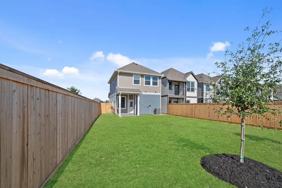 Exterior details and patio area of a home in Bridgeland, Cypress (Image 4).