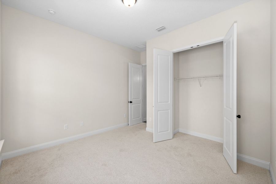 Representative unfurnished interior of a home built from the Aurora by Riverside Homes in Hidden Creek at SilverLeaf, St. Augustine (Image 22).