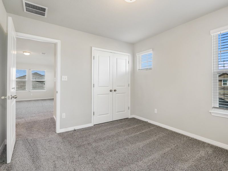 Spacious, unfurnished interior of a new home in Butler Farms - Reserve Collection, Liberty Hill (Image 10).