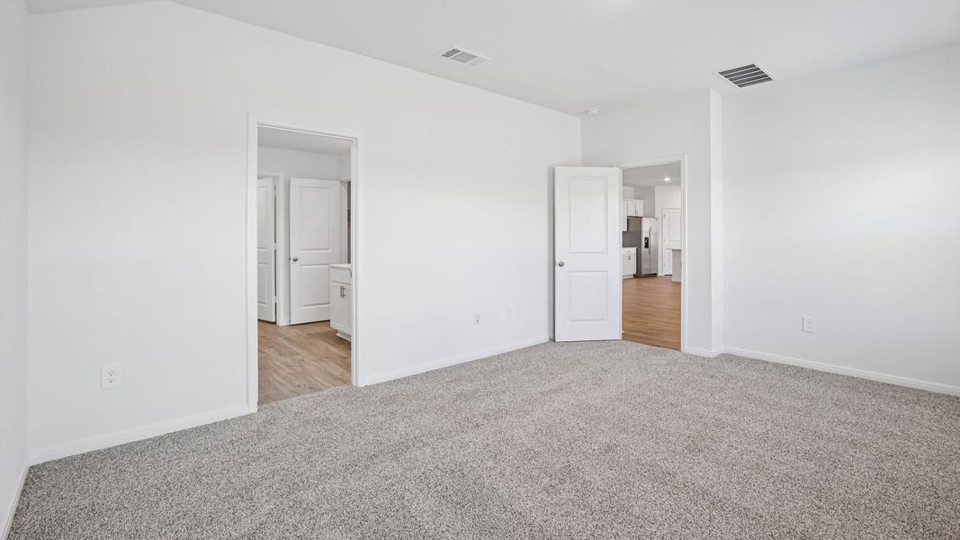 Spacious, unfurnished interior of a new home in Prairie Lakes, Buda (Image 42).
