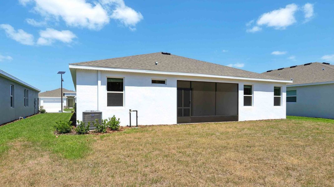 Representative exterior photo of a completed home built from the Destin by D.R. Horton in Ocala Preserve, Ocala, FL (Image 1).