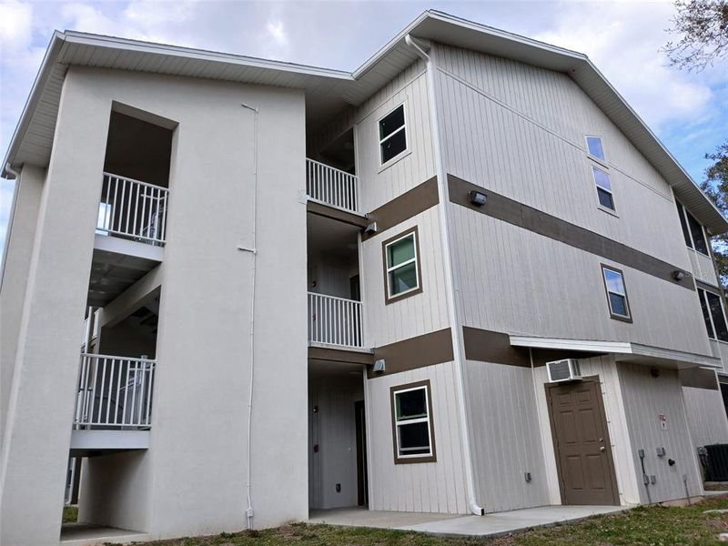 Front exterior of a new home in , Gainesville, FL, highlighting curb appeal (Image 1).
