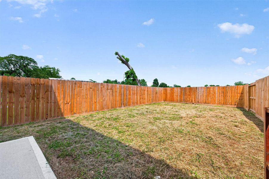 Exterior details and patio area of a home in , Houston (Image 3).