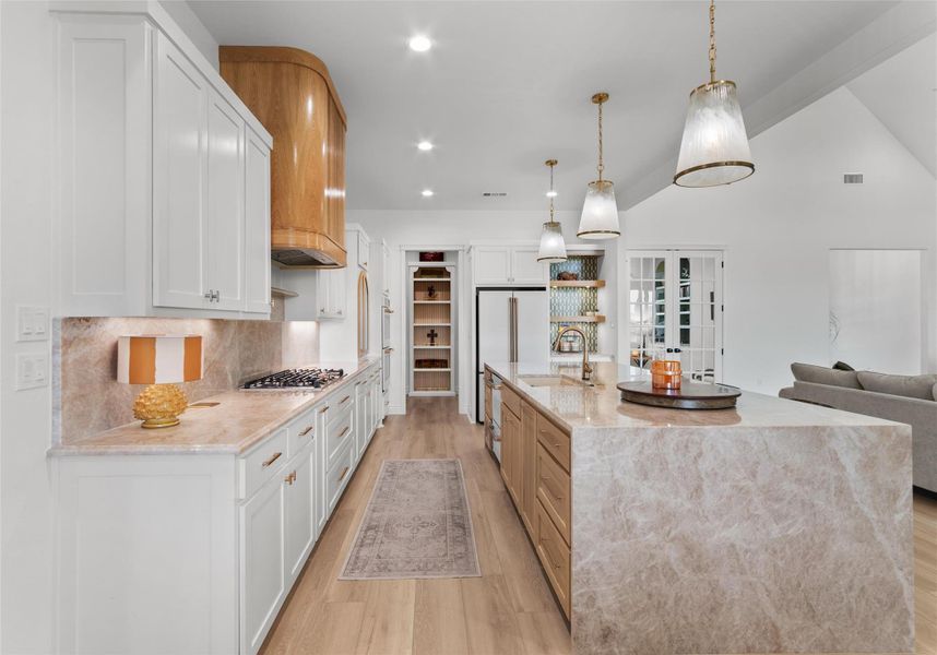 Kitchen has double ovens, GAS COOKTOP and custom white and brushed champagne café appliances Kitchen has double ovens, GAS COOKTOP and custom white and brushed champagne café appliances