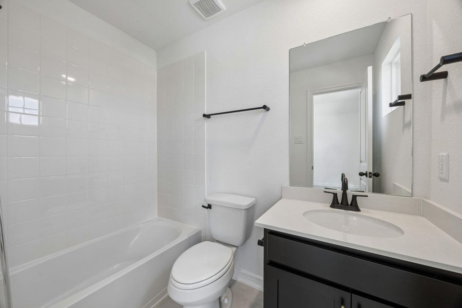 Furnished interior view inside a new home in Brookewater, Rosenberg (Image 11).