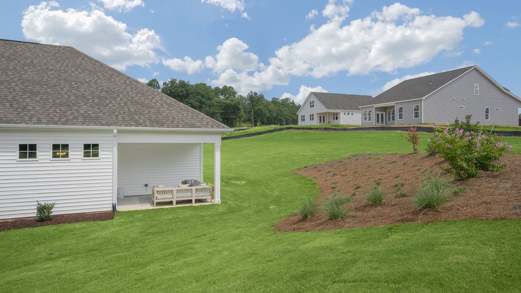 Exterior details and patio area of a home in The Villas at Martin Farms, Aberdeen (Image 4).