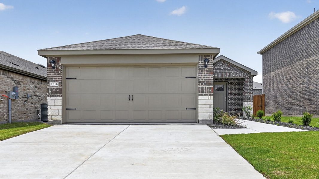 Front exterior of a new home in Creekside Ranch, Blue Ridge, TX, highlighting curb appeal (Image 2). Front exterior of a new home in Creekside Ranch, Blue Ridge, TX, highlighting curb appeal (Image 2).