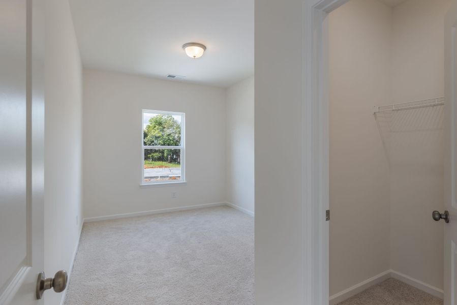 Large bedroom with walk-in closet.