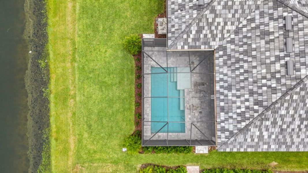 Exterior details and patio area of a home in River Preserve Estates, Parrish (Image 36).