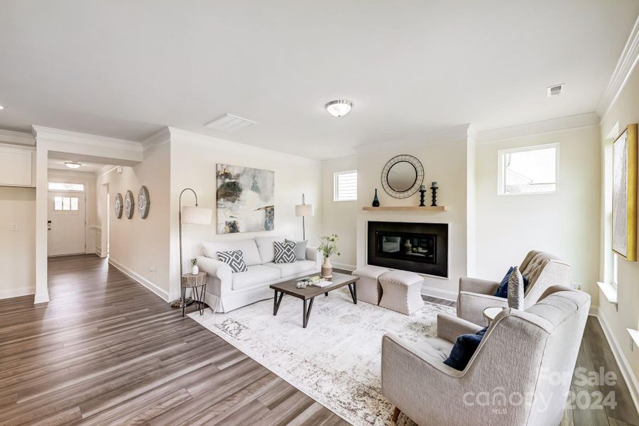 Family Room features a Cosmo Fireplace