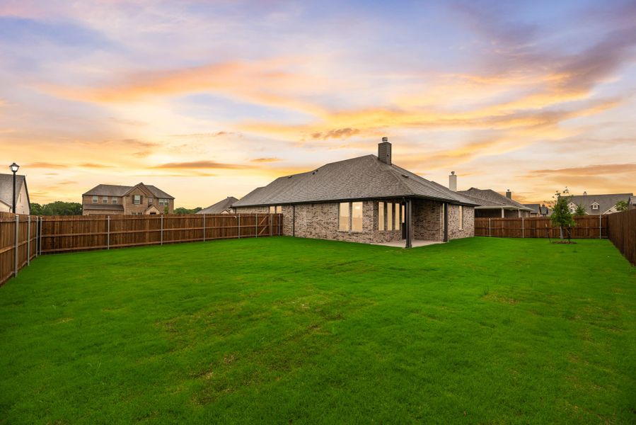 Exterior details and patio area of a home in Aero Vista, Caddo Mills (Image 33).