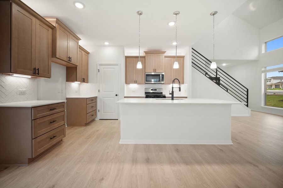 Furnished interior view inside a new home in The Hills of Bear Creek, Manchaca (Image 8).