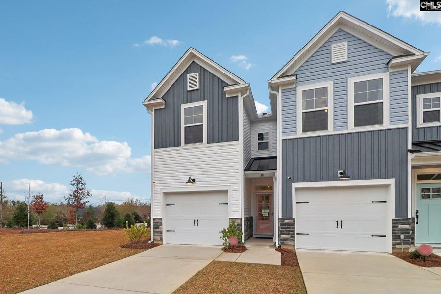 Front exterior of a new home in Walker’s Trail, Lexington, SC, highlighting curb appeal (Image 27). Front exterior of a new home in Walker’s Trail, Lexington, SC, highlighting curb appeal (Image 27).