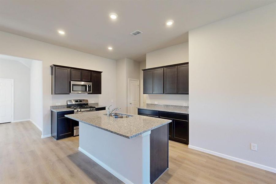 Furnished interior view inside a new home in Kings Way, Denton (Image 8).