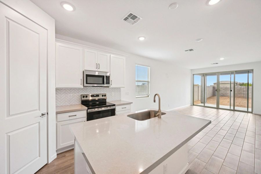 Kitchen, dining and great room