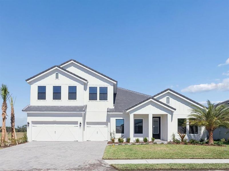 Front exterior of a new home in Oakfield, Parrish, FL, highlighting curb appeal (Image 1).