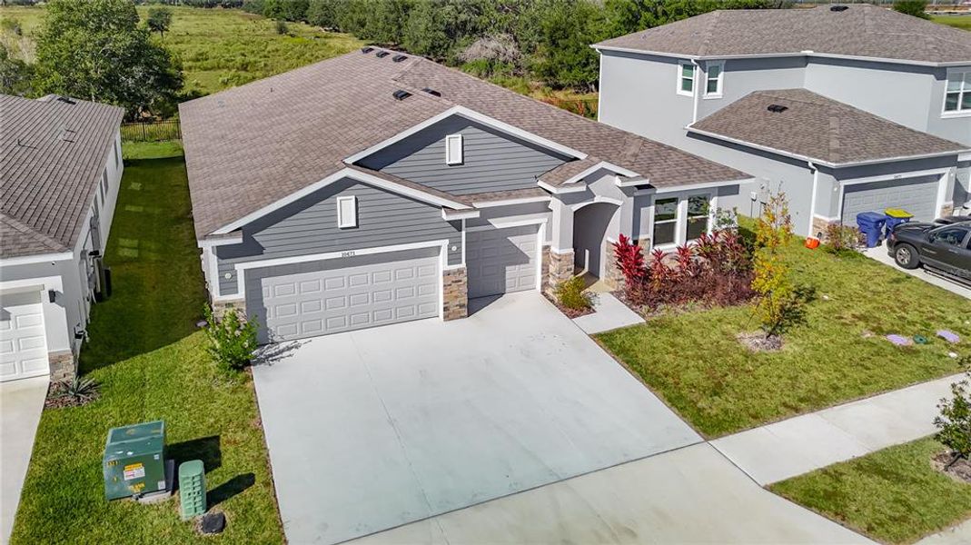 Front exterior of a new home in Mirada, San Antonio, FL, highlighting curb appeal (Image 27).